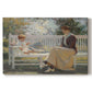 Canvas art print portraying a woman and child seated outdoors in natural light, set against a white background
