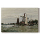 Canvas art print portraying a single windmill beside water with surrounding buildings and sky, set against a white background