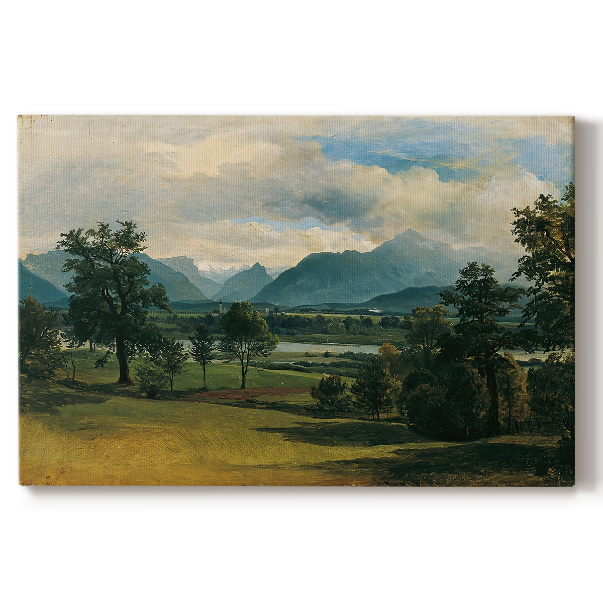 Canvas art print portraying a village landscape and countryside under wide sky, set against a white background
