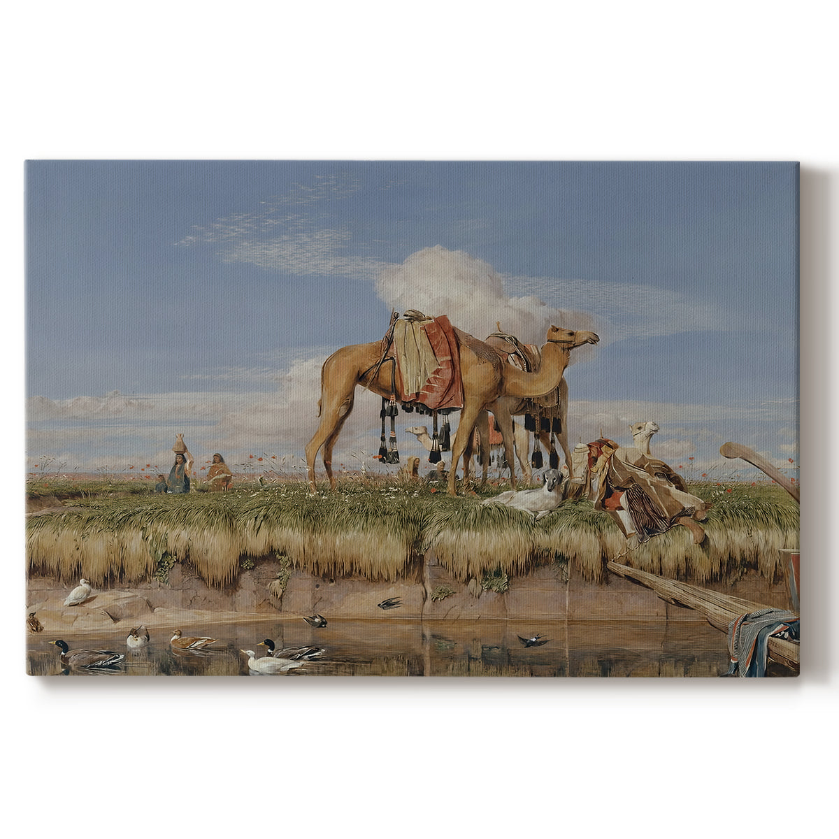 Canvas art print portraying figures and animals along riverbank with desert landscape, set against a white background