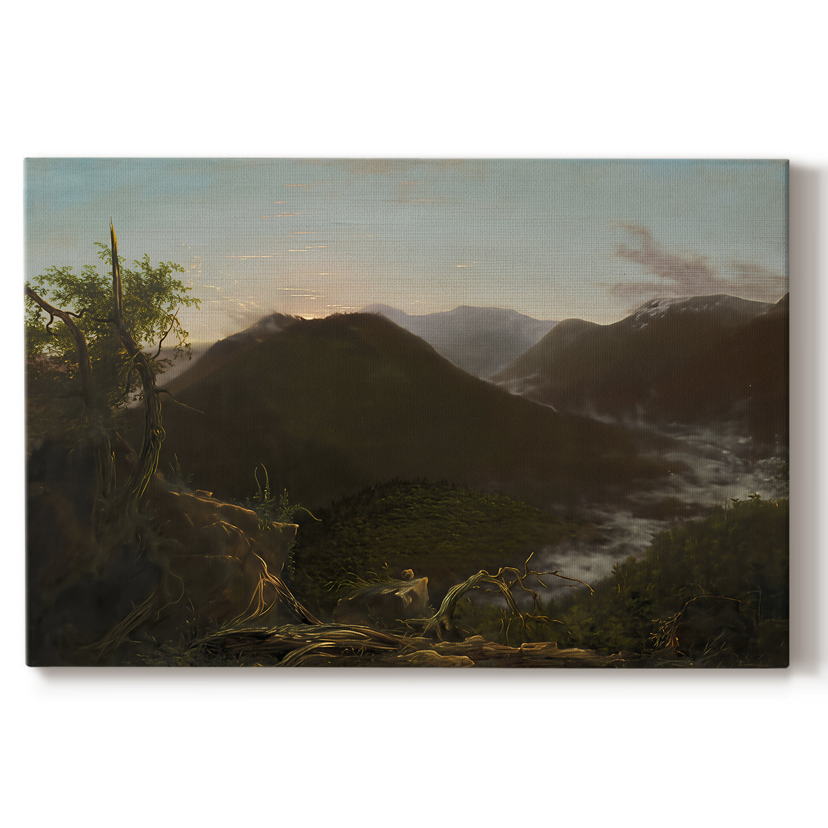 Canvas art print portraying a mountain valley at sunrise with light spreading across trees and hills, set against a white background