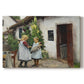 Canvas art print portraying a woman and child standing outside farmhouse searching for missing kitten, set against a white background