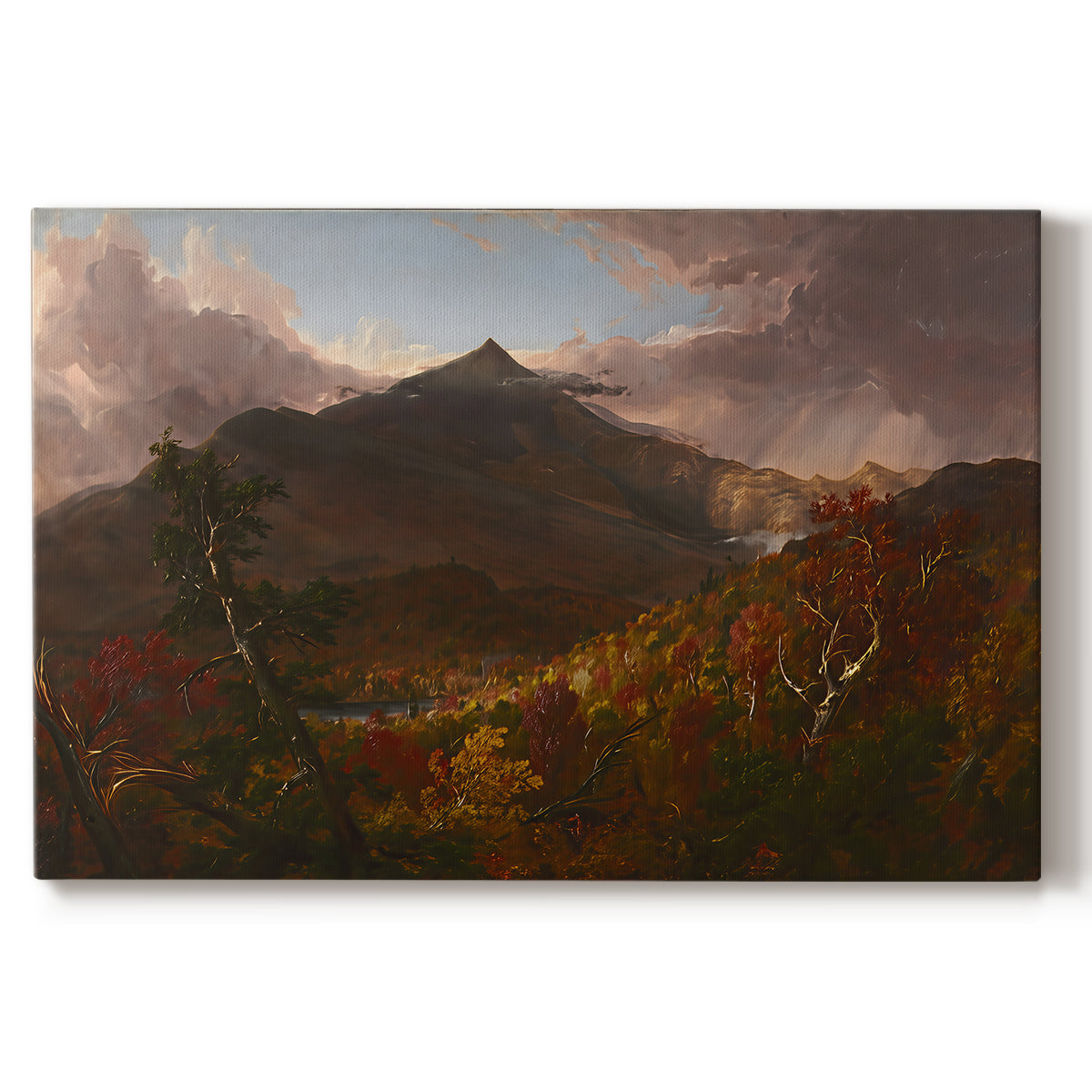 Canvas art print portraying a mountain landscape clearing after storm with sunlight breaking through clouds, set against a white background