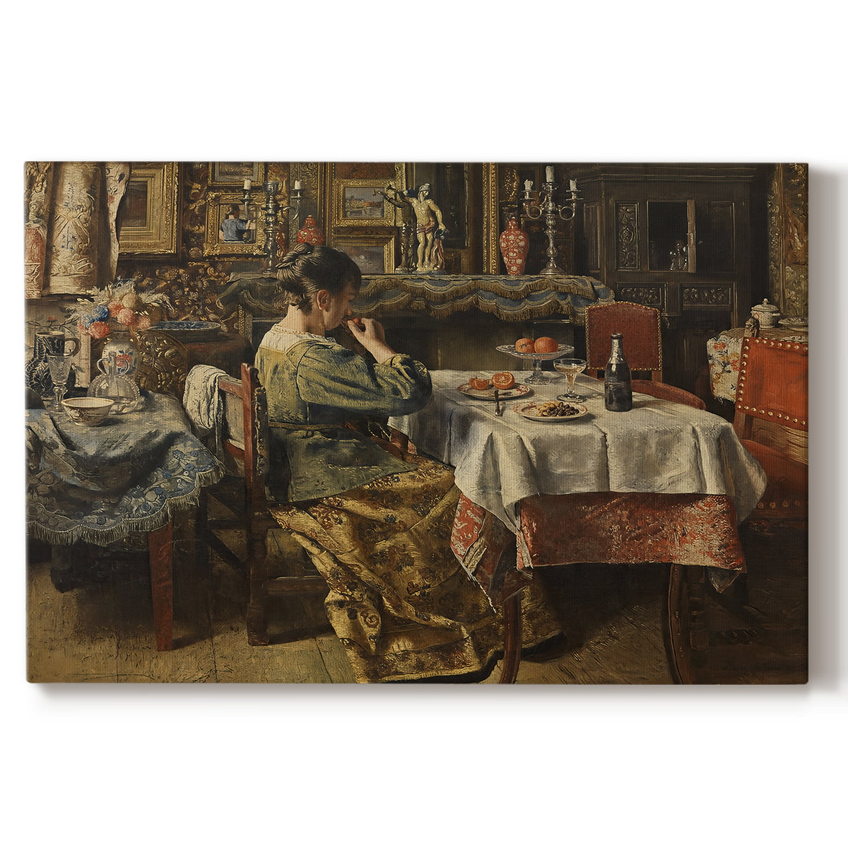 Canvas art print portraying a group of people seated around table sharing meal in interior, set against a white background