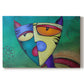 Canvas art print portraying a colorful geometric cat face with angular shapes, set against a white background