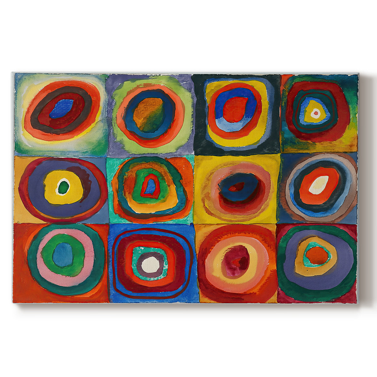 Canvas art print portraying a grid of squares each containing concentric circular color patterns, set against a white background