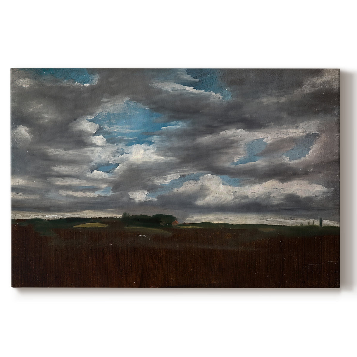 Canvas art print portraying a wide landscape beneath heavy grey clouds, set against a white background