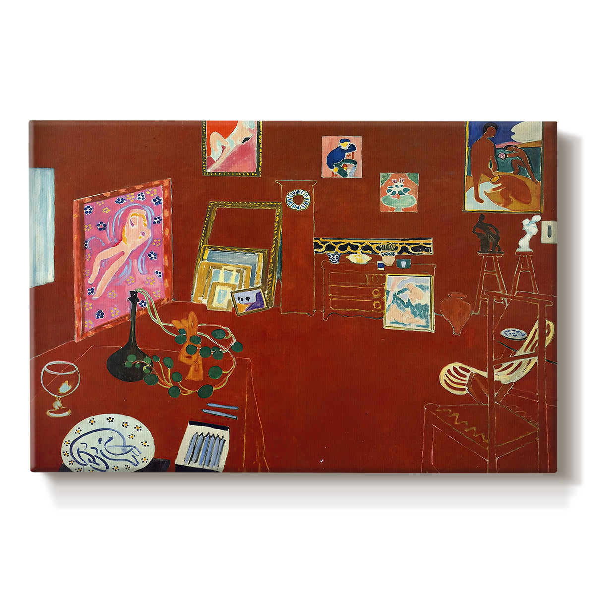 Canvas art print portraying a red studio interior with furniture and artworks, set against a white background