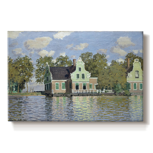 Canvas art print portraying a row of houses along river with reflections in calm water, set against a white background