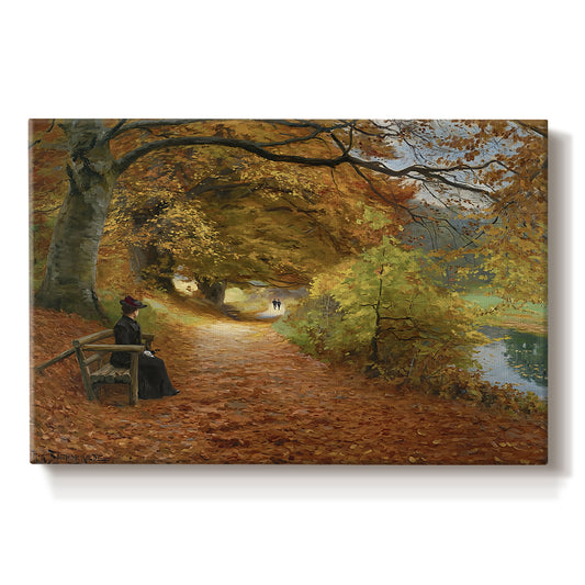 Canvas art print portraying figures walking along forest path covered in autumn leaves, set against a white background