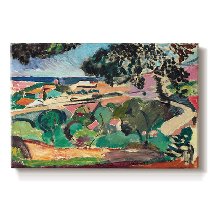 Canvas art print portraying a vivid landscape with hills, trees, and buildings near the coast, set against a white background
