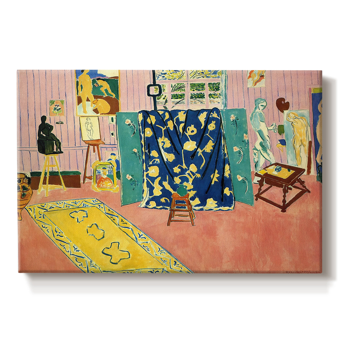 Canvas art print portraying a studio interior filled with objects in pink tones, set against a white background