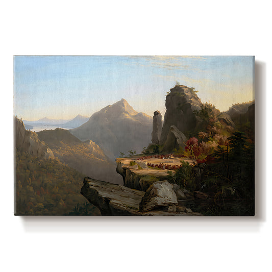 Canvas art print portraying a rugged mountain landscape with small figures near water and rocky cliffs, set against a white background