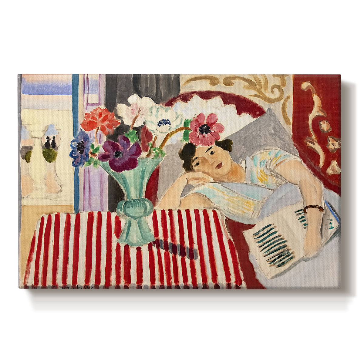Canvas art print portraying a seated woman beside vase of anemones in richly patterned interior, set against a white background