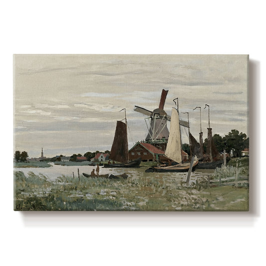 Canvas art print portraying a single windmill beside water with surrounding buildings and sky, set against a white background