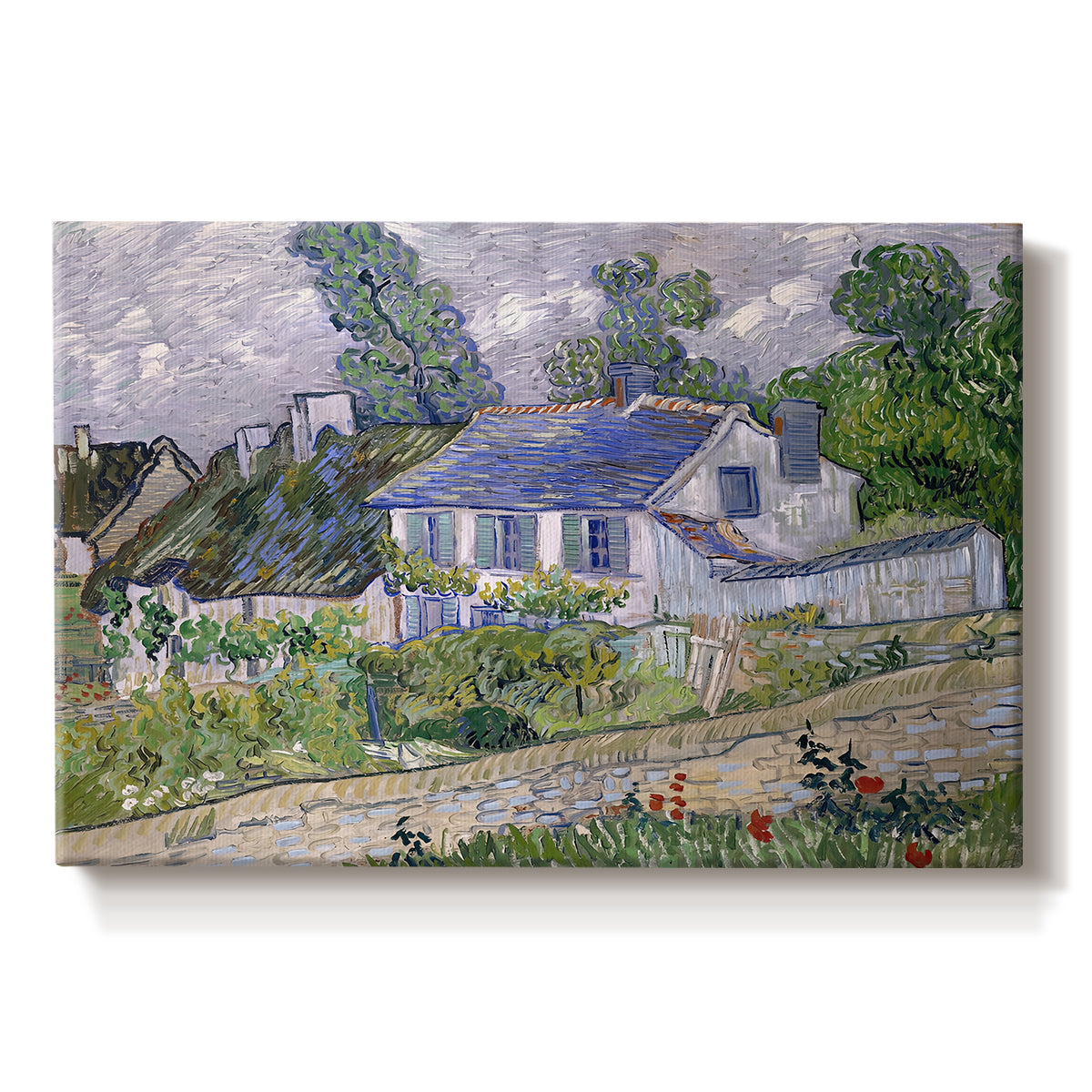 Canvas art print portraying village houses clustered along road with surrounding greenery under open sky, set against a white background