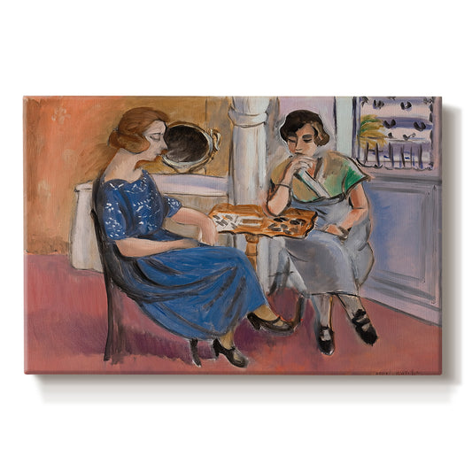 Canvas art print portraying two figures seated at a table playing dominoes in a colorful interior, set against a white background