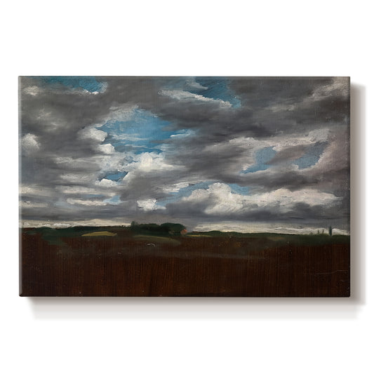 Canvas art print portraying a wide landscape beneath heavy grey clouds, set against a white background