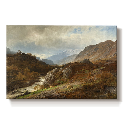 Canvas art print portraying a rugged mountain terrain with valley and distant peaks under open sky, set against a white background