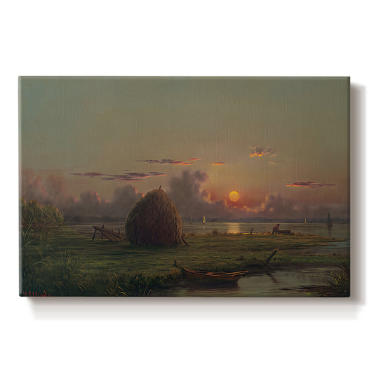 Canvas art print portraying a haystack in field under warm sunset sky, set against a white background