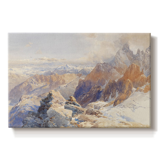 Canvas art print portraying a mountain pass with snow-covered peaks and expansive alpine valley, set against a white background