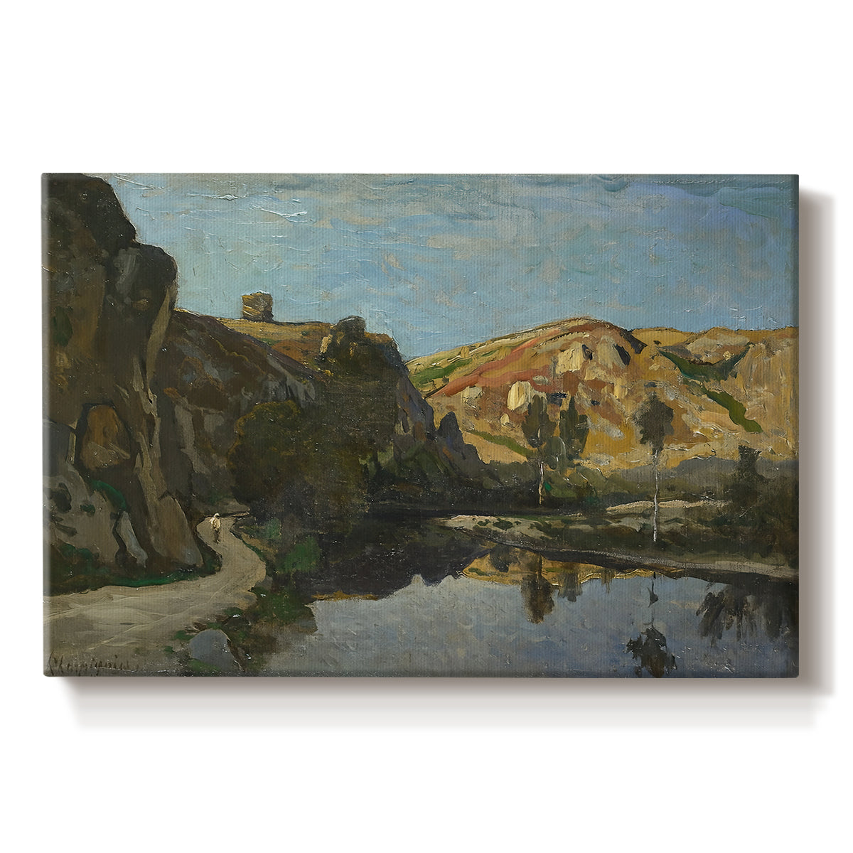 Canvas art print portraying a river flowing between rocky cliffs under open sky, set against a white background