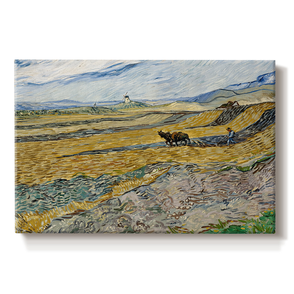 Canvas art print portraying a ploughed field enclosed by low walls with lone worker under broad sky, set against a white background