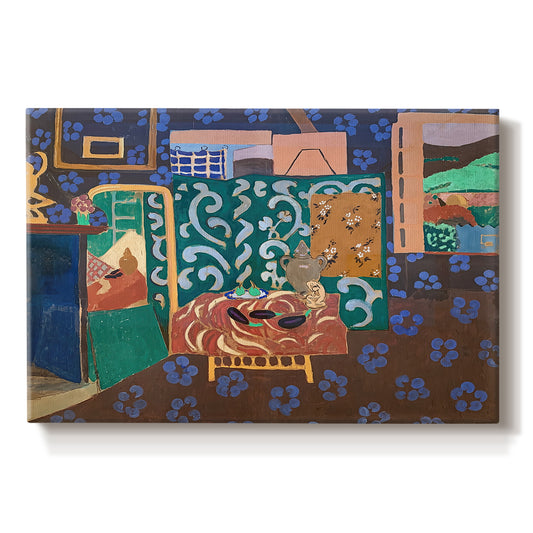 Canvas art print portraying a colorful interior with table, aubergines, and richly patterned surfaces, set against a white background