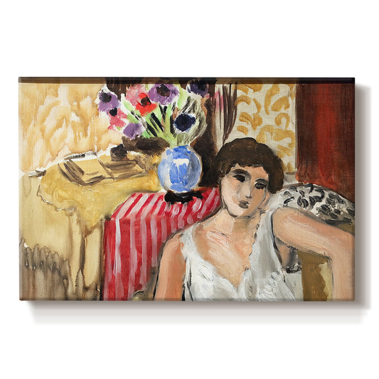 Canvas art print portraying a seated woman in an armchair in a colorful interior, set against a white background