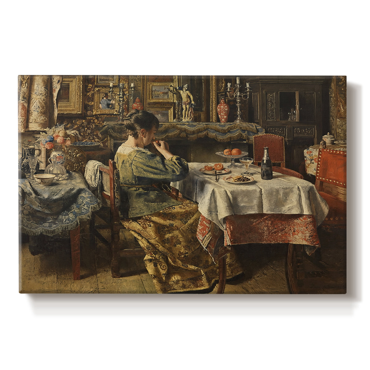 Canvas art print portraying a group of people seated around table sharing meal in interior, set against a white background
