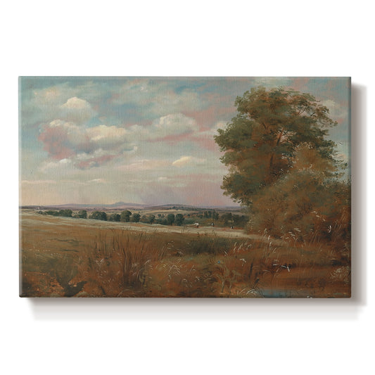 Canvas art print portraying a wide landscape with distant buildings across terrain, set against a white background