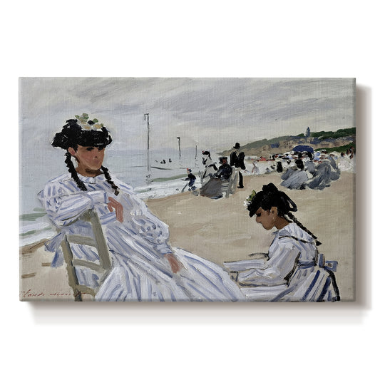 Canvas art print portraying figures seated on beach with parasols facing the ocean, set against a white background