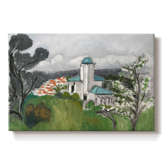 Canvas art print portraying a blue villa surrounded by trees and greenery in a bright landscape, set against a white background