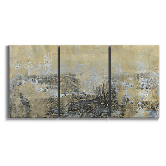Three-panel canvas wall art featuring gold toned abstract horizon on white background.
