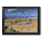Impressionist wheat harvest scene by Vincent van Gogh printed on canvas in an ornate black frame with gilded inner detail.