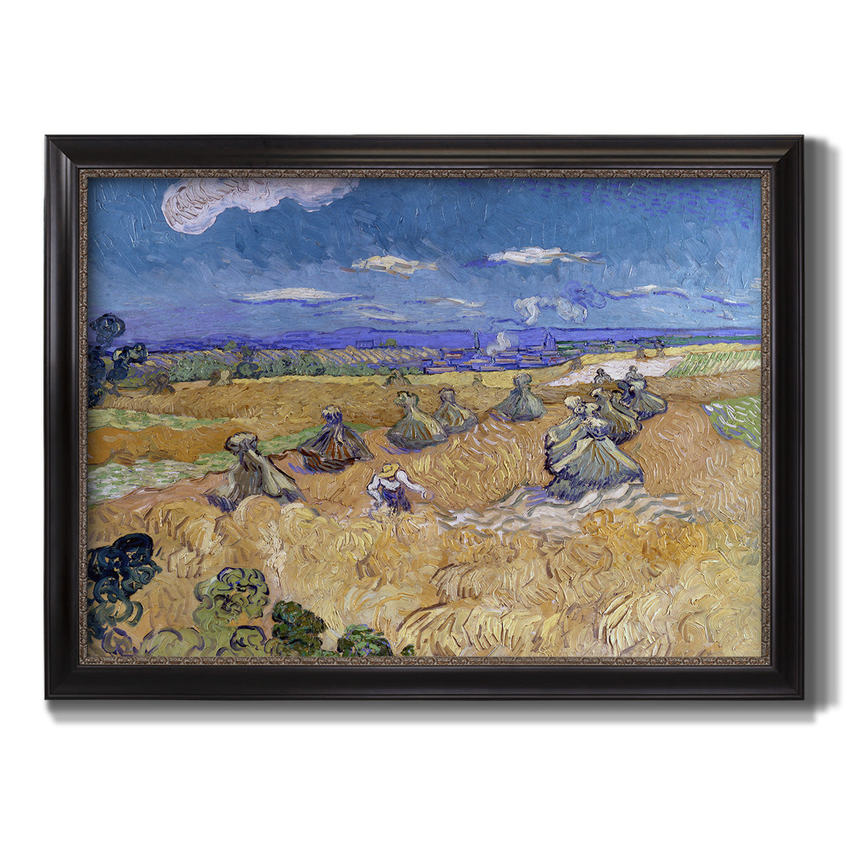 Impressionist wheat harvest scene by Vincent van Gogh printed on canvas in an ornate black frame with gilded inner detail.