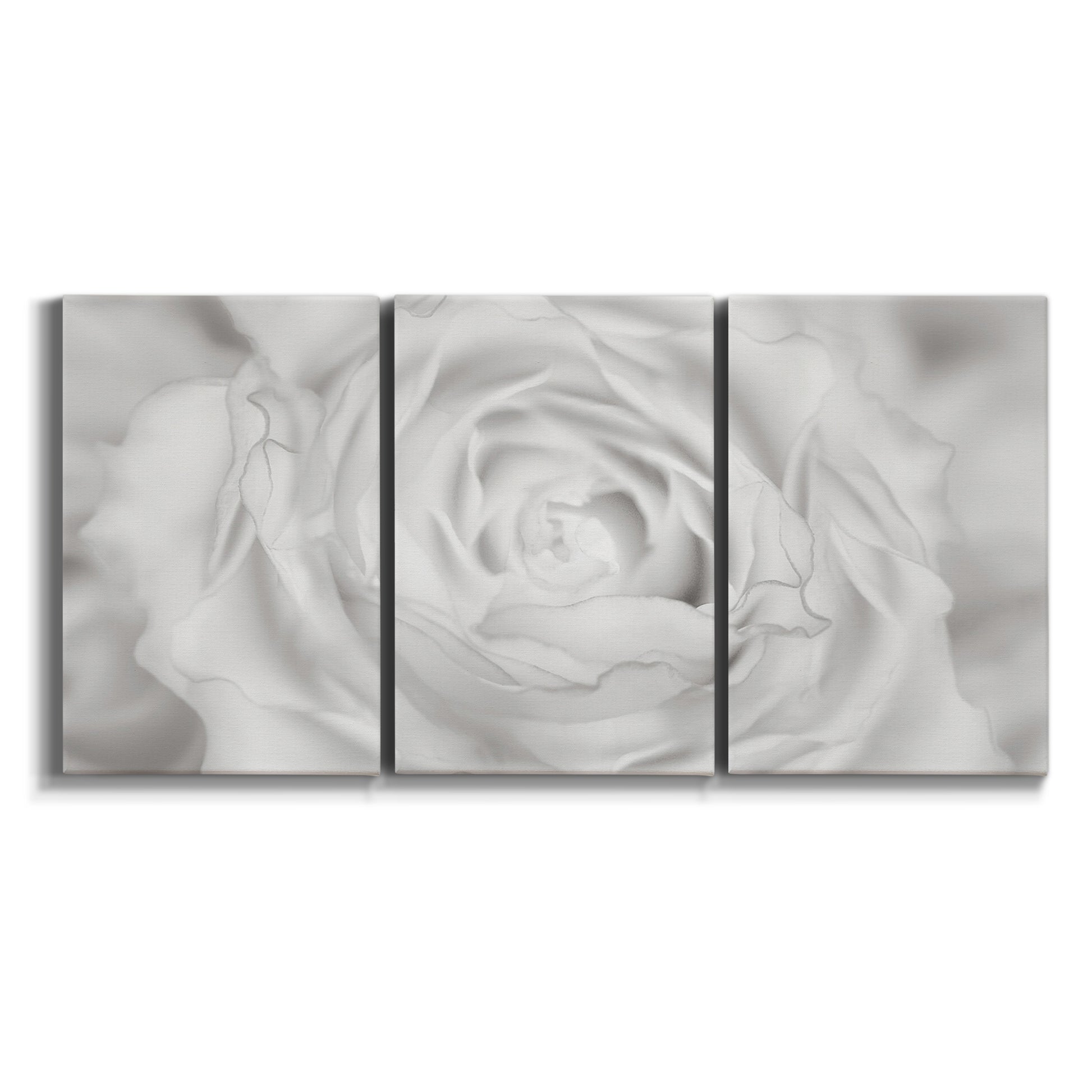 Three-panel canvas wall art featuring monochrome rose study photograph on white background.