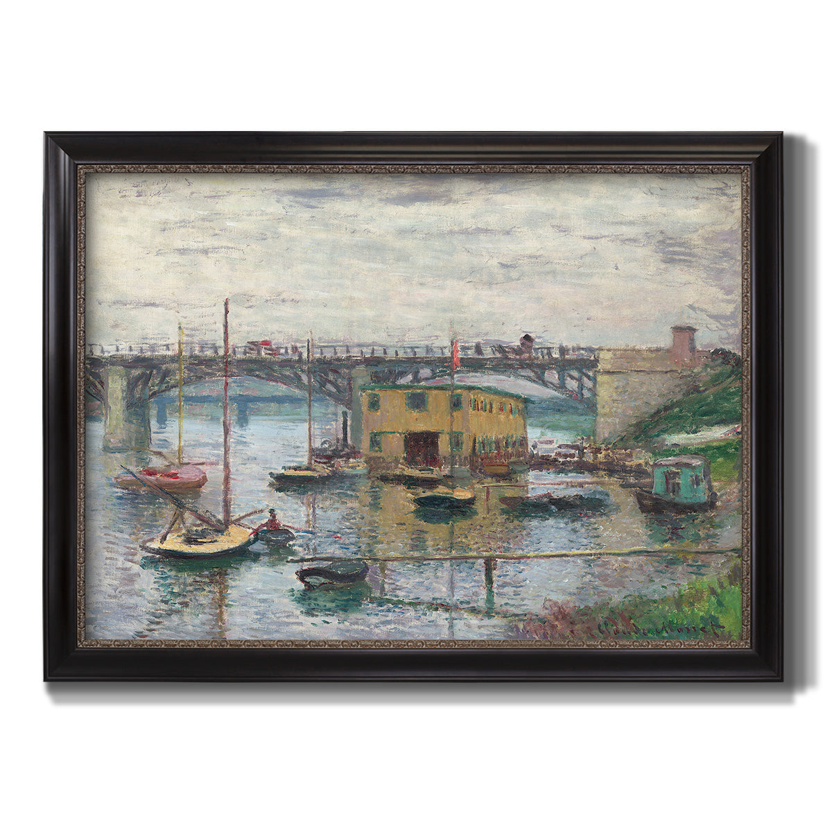 Impressionist river bridge scene on an overcast day by Claude Monet printed on canvas in an ornate black frame with gilded inner detail.