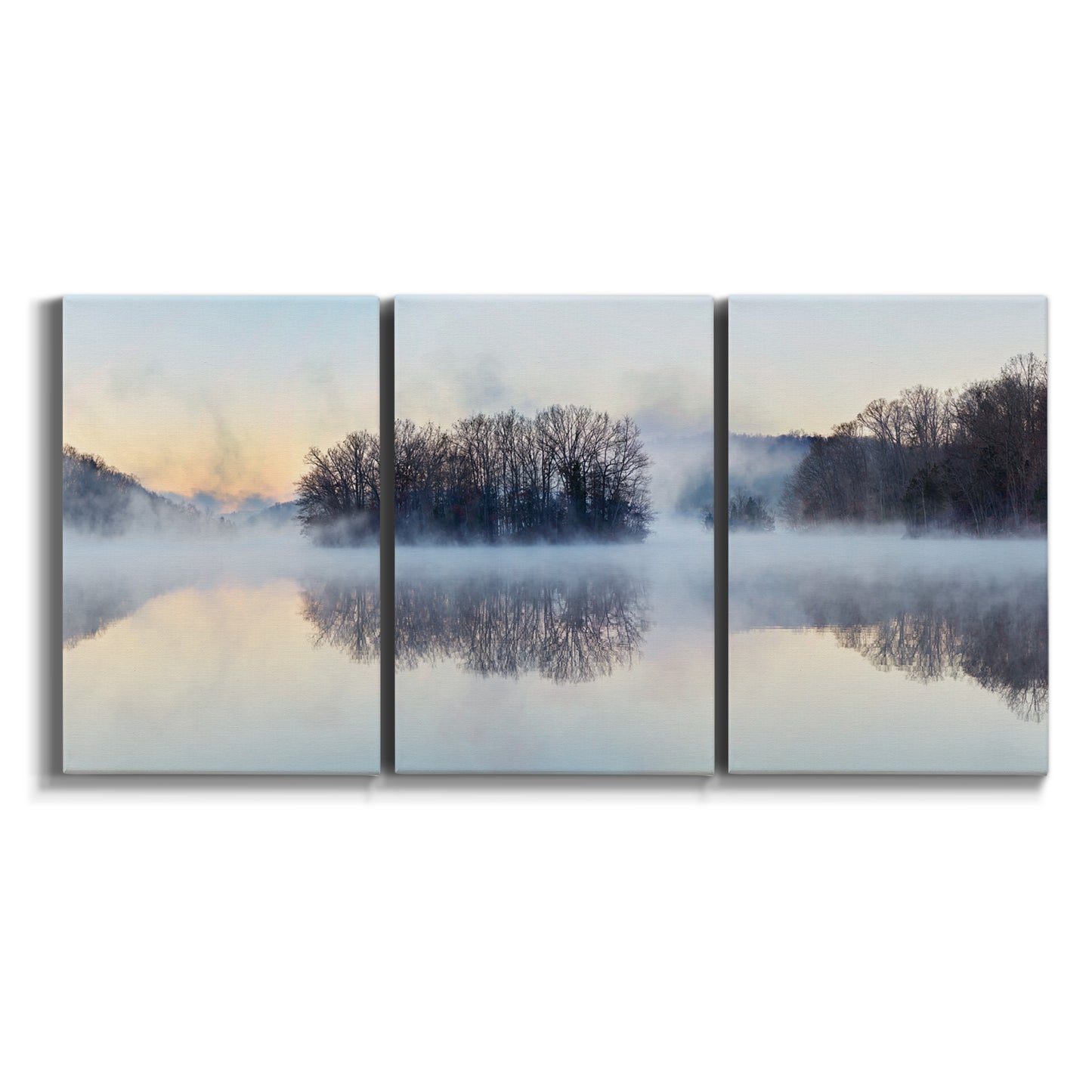 Three-panel canvas wall art featuring misty water landscape photograph on white background.