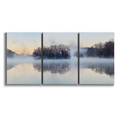 Three-panel canvas wall art featuring misty water landscape photograph on white background.