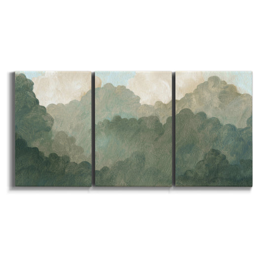 Three-panel canvas wall art featuring autumn storm over rolling landscape on white background.