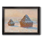 Impressionist winter haystack scene by Claude Monet printed on canvas in an ornate black frame with gilded inner detail.