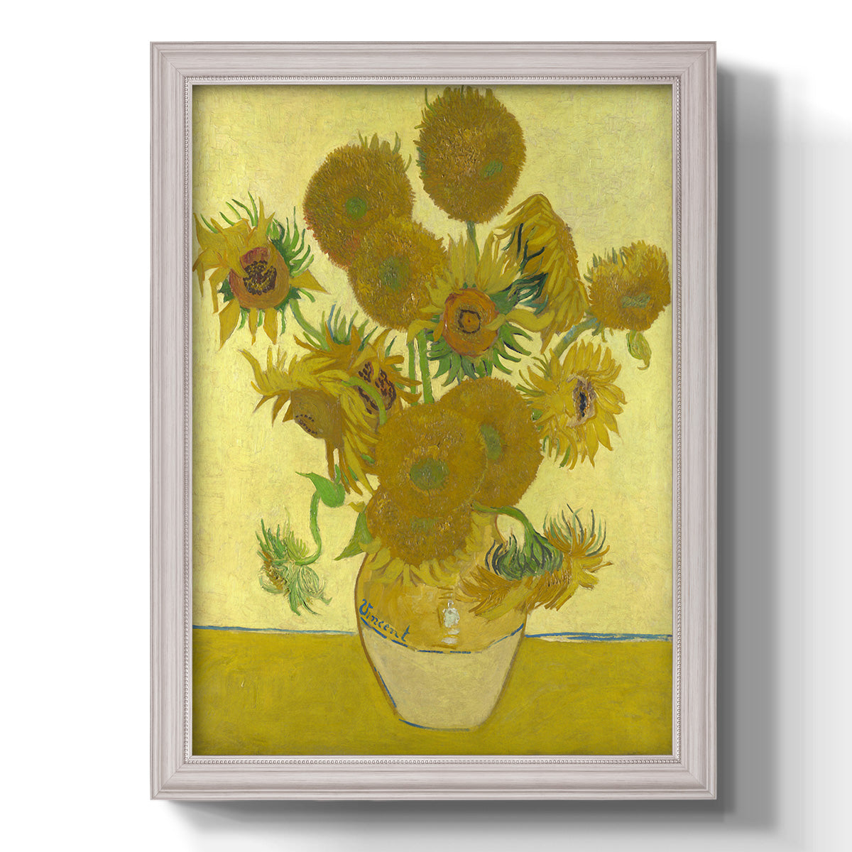 Impressionist sunflower still life painting by Vincent van Gogh printed on canvas in an ornate champagne frame with a vertical orientation.
