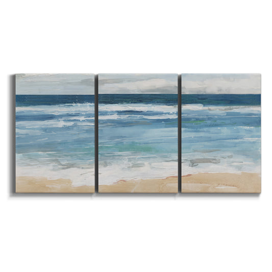 Three-panel canvas wall art featuring rolling ocean waves near shore on white background.