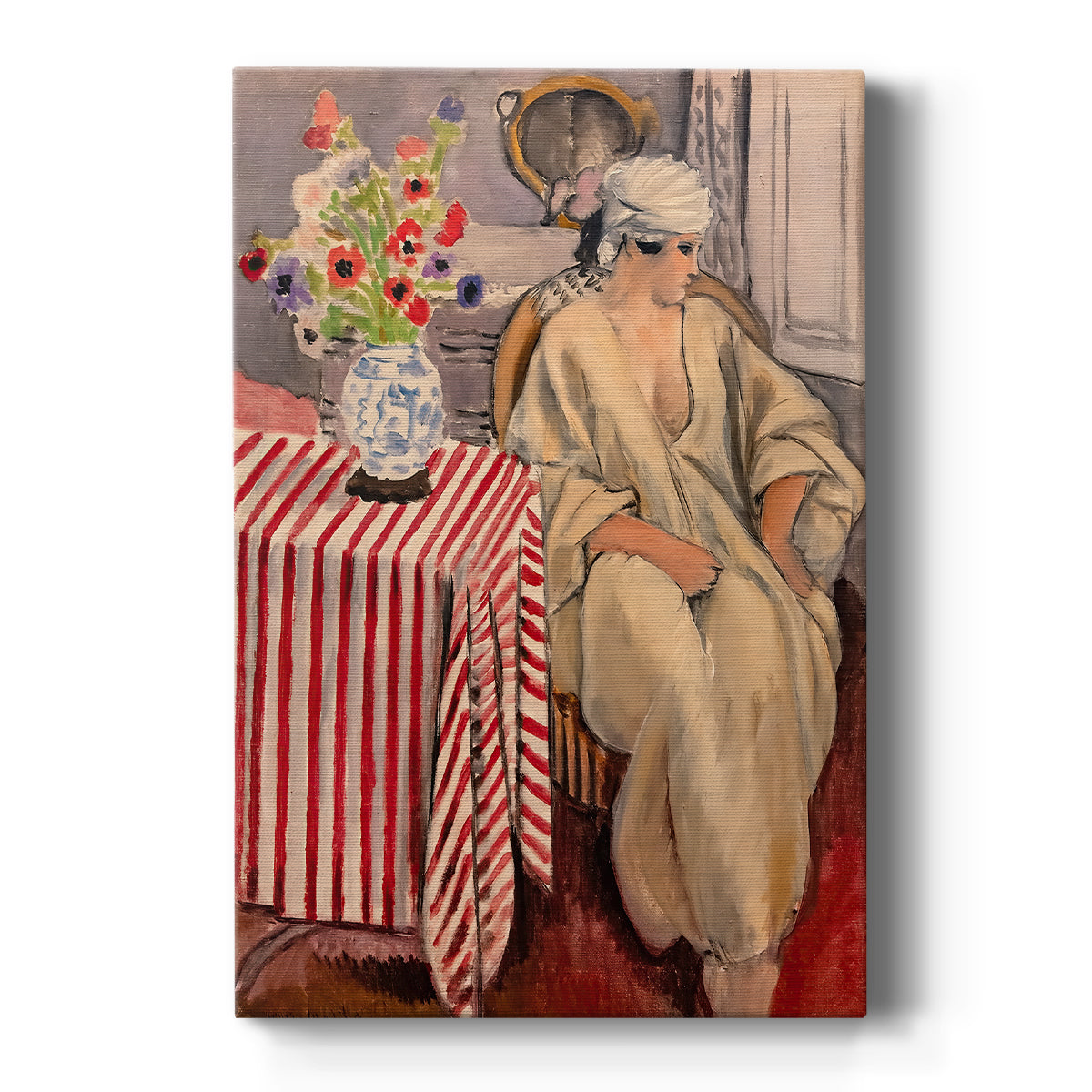 Canvas art print featuring a fauvist interior scene of a seated woman wrapped in patterned textiles on a clean white background.