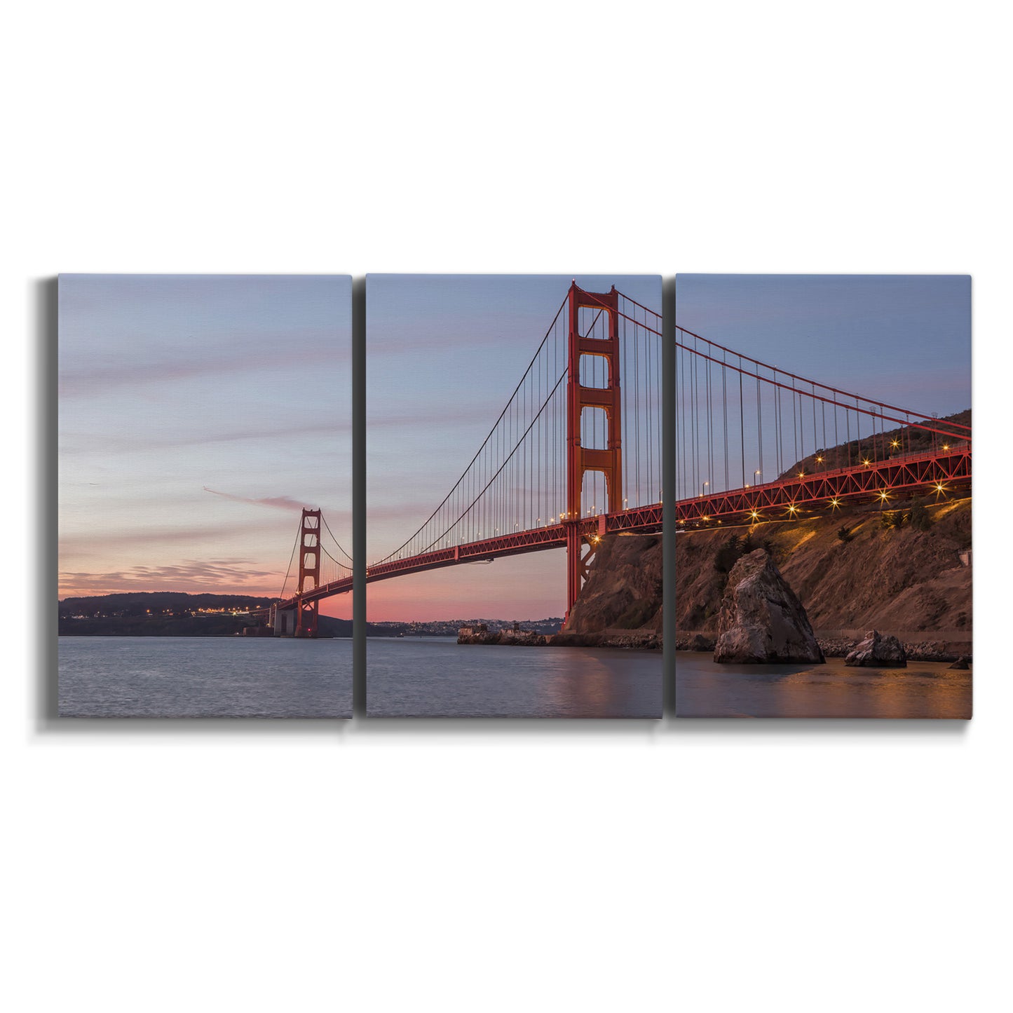 Three-panel canvas wall art featuring golden gate bridge spanning bay on white background.