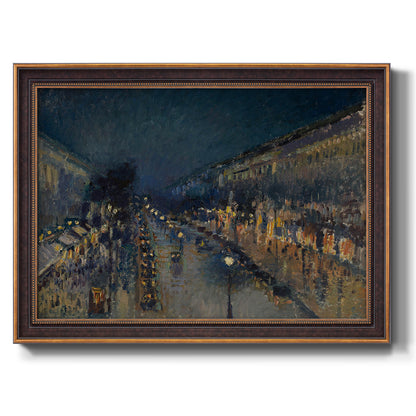 Impressionist nighttime Paris street scene by Camille Pissarro printed on canvas in an ornate bronzed mahogany wood frame.