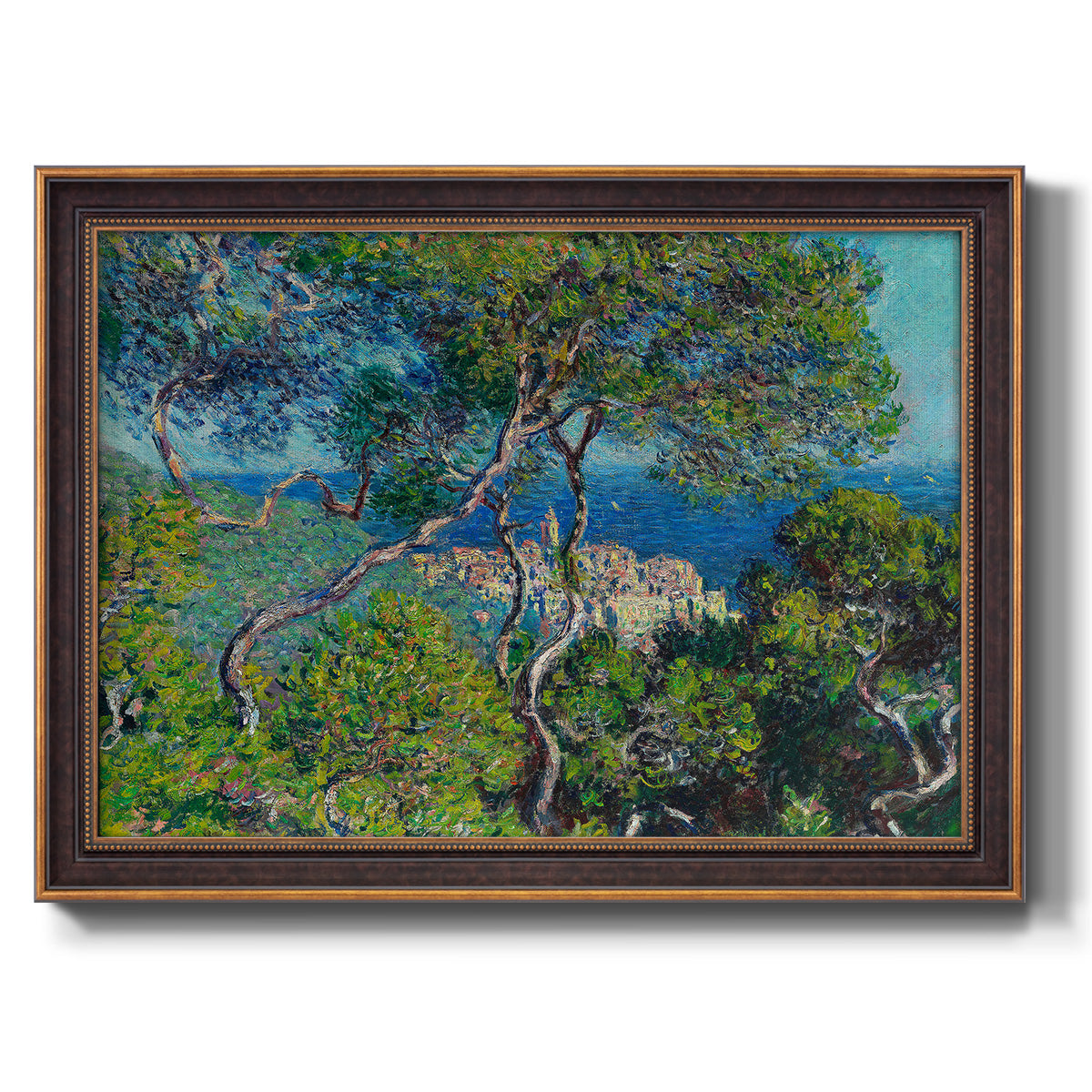 Impressionist Mediterranean coastal landscape by Claude Monet printed on canvas in an ornate bronzed mahogany wood frame.