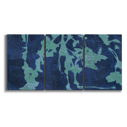 Three-panel canvas wall art featuring abstract floral shapes on white background.