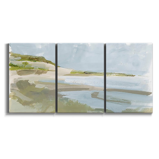 Three-panel canvas wall art featuring coastal cove with calm water on white background.
